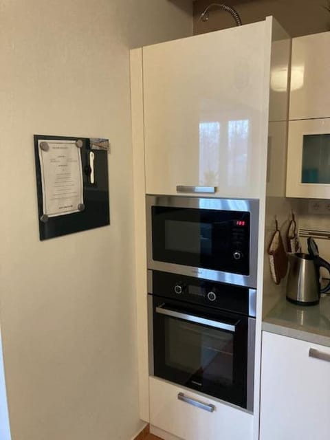 Kitchen or kitchenette, microwave, oven