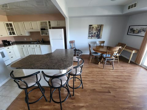 Kitchen or kitchenette, Seating area, Dining area, dishwasher, oven, stove