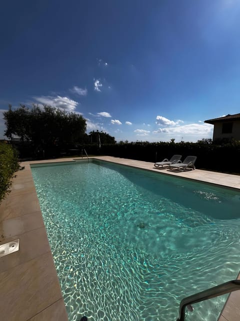 Property building, Living room, Swimming pool