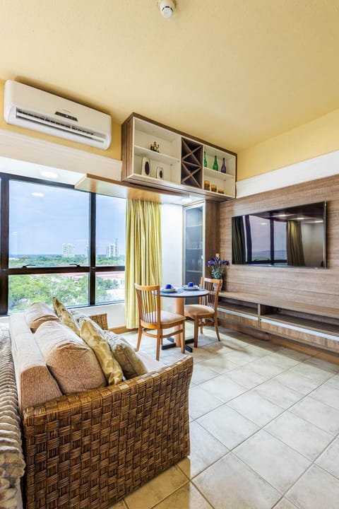 Communal lounge/ TV room, TV and multimedia, Living room, Seating area, air conditioner