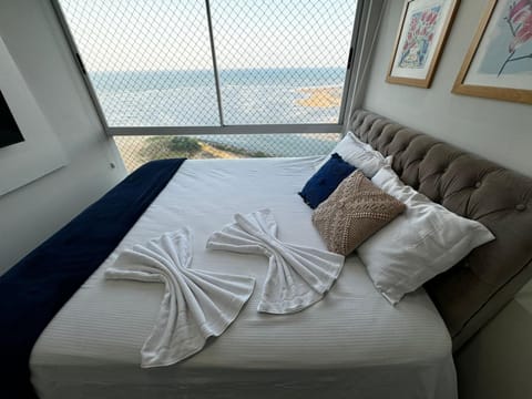 Bed, Natural landscape, Bedroom, Sea view, towels, wardrobe