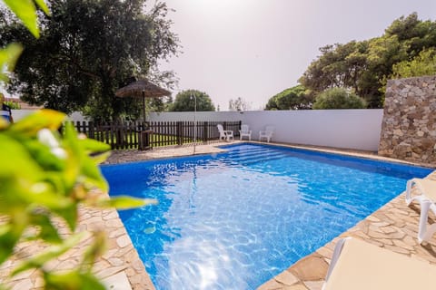 Property building, Living room, Swimming pool