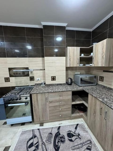 Kitchen or kitchenette, oven, stove