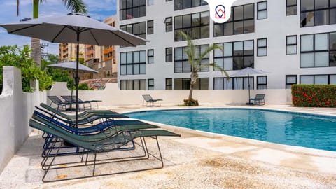 Property building, Day, Pool view, Swimming pool, sunbed