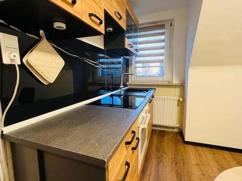 Kitchen or kitchenette, stove