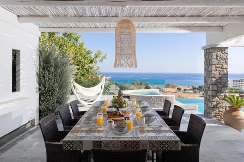 Patio, Day, View (from property/room), Dining area, Pool view, Sea view, Swimming pool