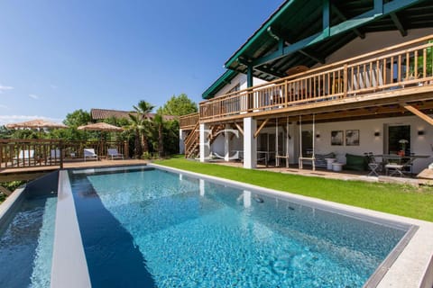 Property building, Patio, Day, Garden, Garden view, Pool view, Swimming pool, sunbed