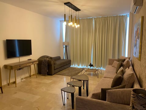 Communal lounge/ TV room, TV and multimedia, Living room, Seating area, Evening entertainment