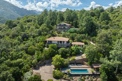 Property building, Natural landscape, Bird's eye view, Mountain view, Swimming pool