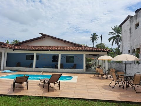 Property building, Day, Pool view, Swimming pool, sunbed