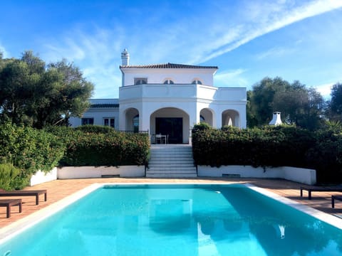 Property building, Living room, Swimming pool