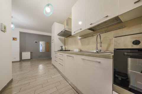 Kitchen or kitchenette, oven, stove