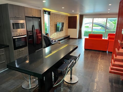 Dining area, microwave, oven, kitchen