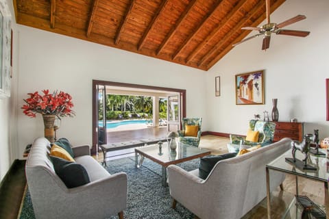 Living room, Seating area, Pool view