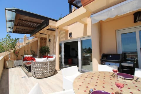 Property building, Patio, BBQ facilities, View (from property/room), Balcony/Terrace, Seating area, Dining area