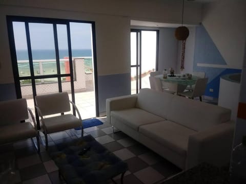 Frente ao mar apto duplex vista show com garagem Apartment in Bertioga