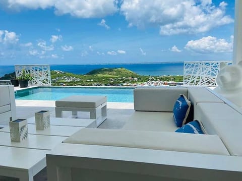 Patio, Living room, Pool view, Sea view, Swimming pool