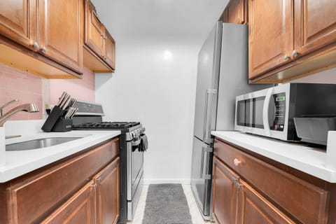 Kitchen or kitchenette, oven, stove