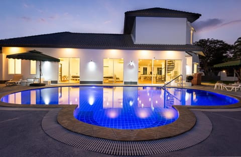 Property building, Patio, Night, Pool view, Swimming pool, sunbed