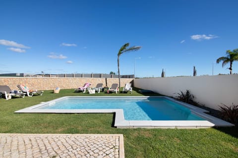 Property building, Living room, Swimming pool