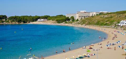 Property building, People, Natural landscape, Beach, Sea view