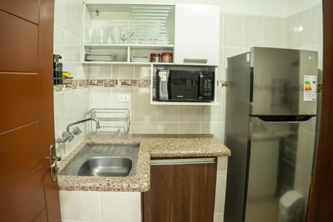 Kitchen or kitchenette, microwave