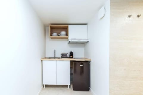 Kitchen or kitchenette, toaster