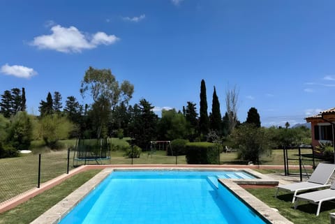 Property building, Living room, Swimming pool