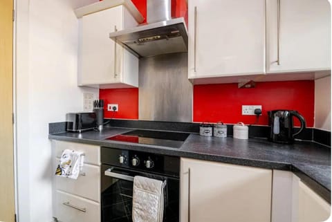 Kitchen or kitchenette, oven, stove