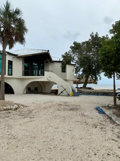 Property building, Day, Natural landscape, Beach, Sea view