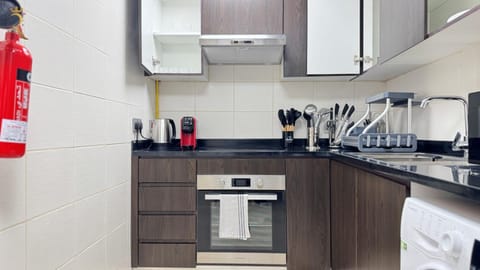 Kitchen or kitchenette, stove, toaster