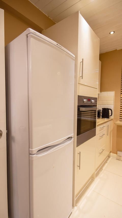 Kitchen or kitchenette, oven