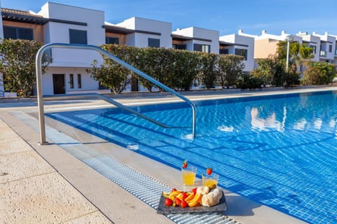 Property building, Day, Pool view, Swimming pool, sunbed