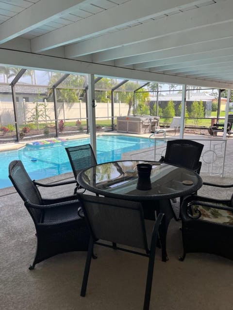 Patio, Seating area, Pool view, Swimming pool