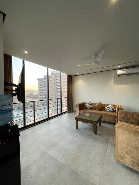 View (from property/room), Living room, Seating area, Dining area, air conditioner