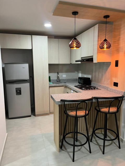 Kitchen or kitchenette, oven, stove