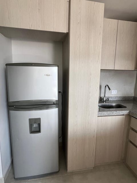 Kitchen or kitchenette, oven, stove