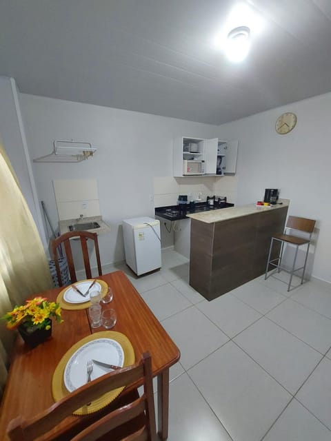 Kitchen or kitchenette, Dining area, stove, laundry