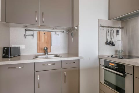 Kitchen or kitchenette, stove