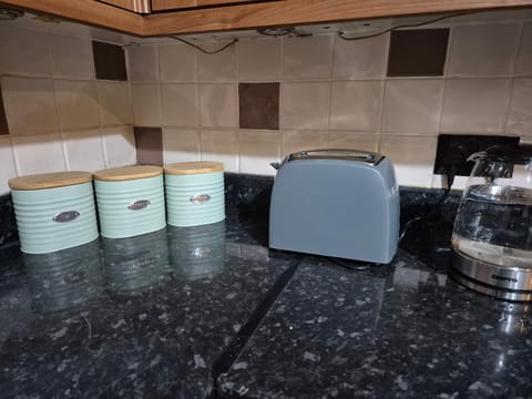 Kitchen or kitchenette, toaster