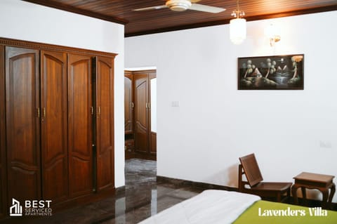 Communal lounge/ TV room, Bed, TV and multimedia, Living room, Photo of the whole room, Seating area, Evening entertainment, Bedroom, fireplace, wardrobe, air conditioner