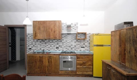 Kitchen or kitchenette, oven, stove