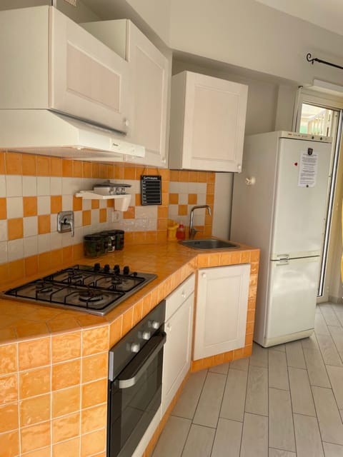 Kitchen or kitchenette, oven, stove