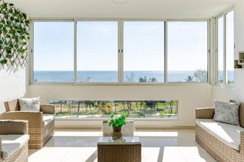 Natural landscape, Living room, Seating area, Sea view