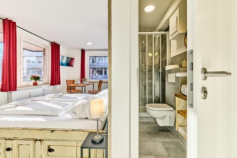 Toilet, Bed, Bathroom, Photo of the whole room, towels