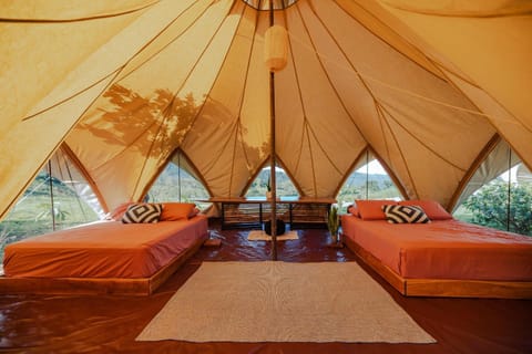 Eco Luxe Glamping Tent - 2 Queen Beds at Holos Campground/ 
RV Resort in Bahía Ballena