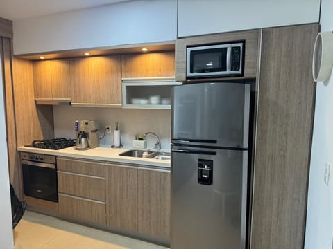 Kitchen or kitchenette, dishwasher, oven, toaster