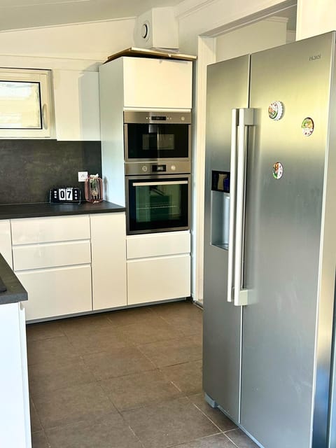 Kitchen or kitchenette, oven, stove