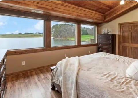 Log Castle and a spring-fed lake House in Carrollton