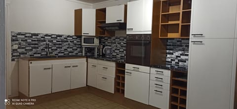 Kitchen or kitchenette, oven, stove